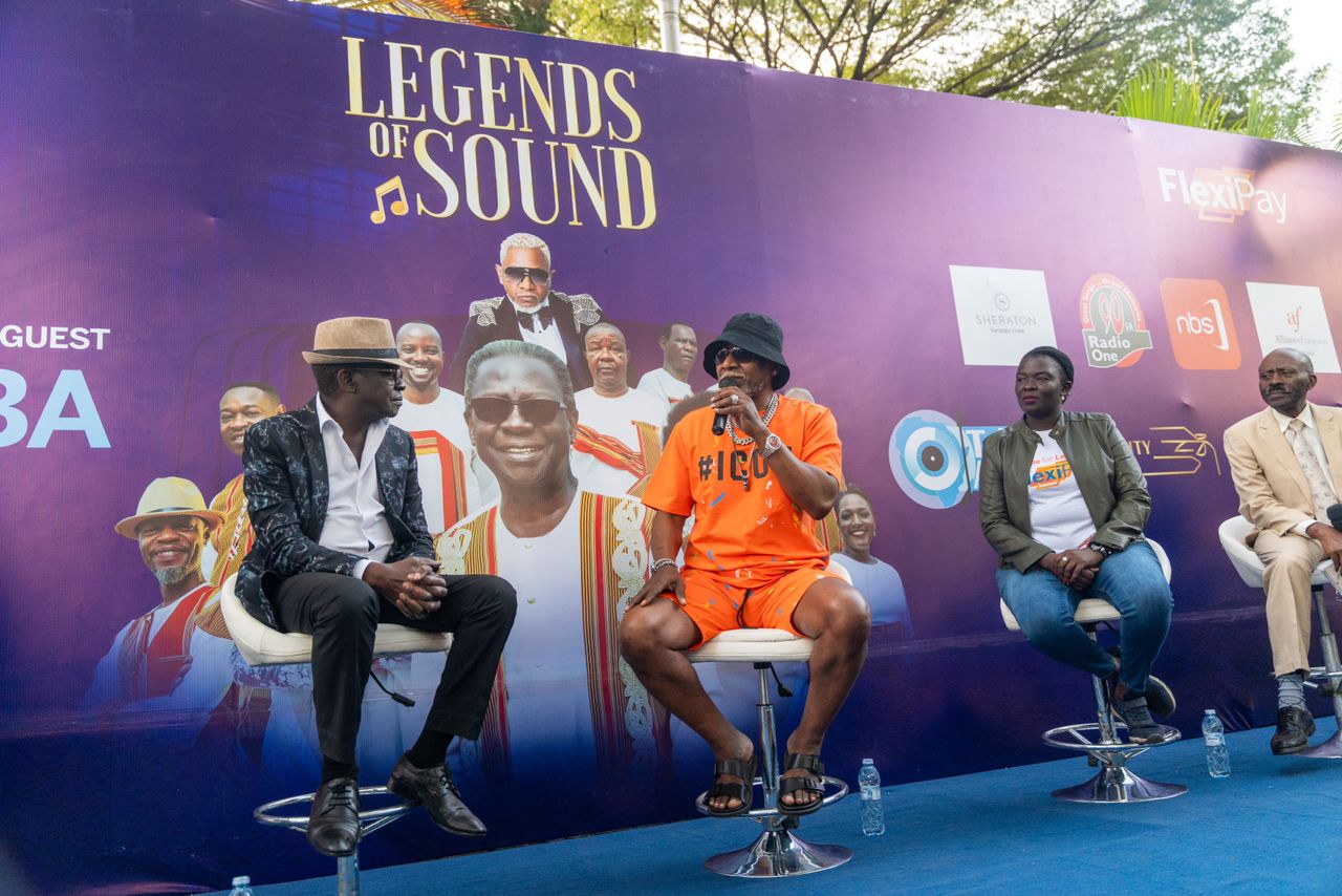 Awilo Longomba and Afrigo Band's Moses Matovu share a moment 